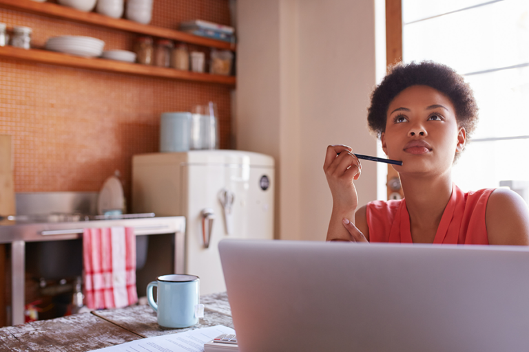 woman thinking about her logo design