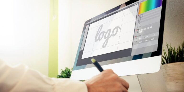 man designing a logo online