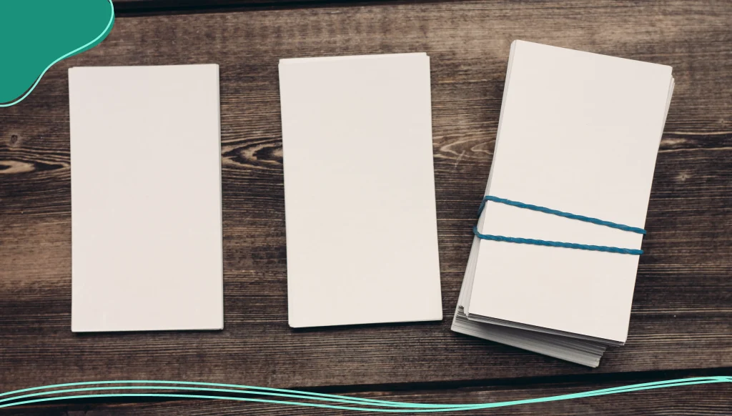 Blank business cards on a wooden table
