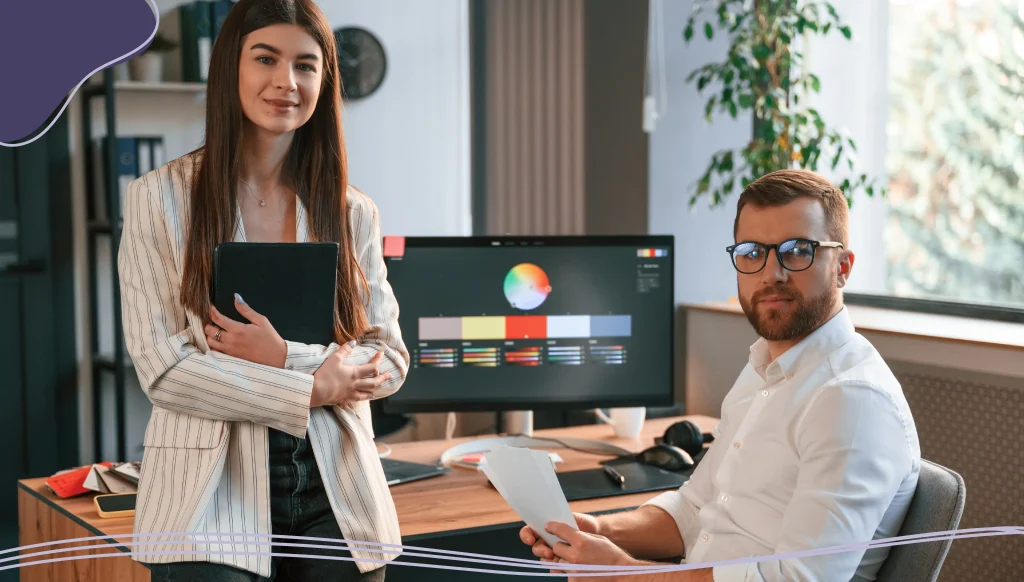 Two designers are working together in the modern office