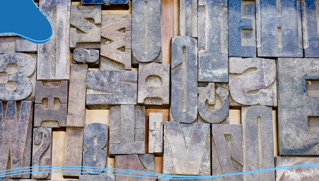 Close up of tray of blue letterpress in printing workshop