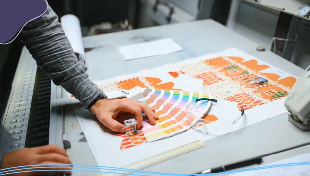Person choosing colors from a color wheel
