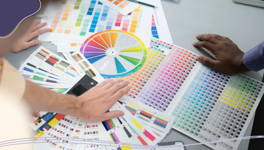Multiethnic team of architects and designers are meeting to brainstorm design an application
