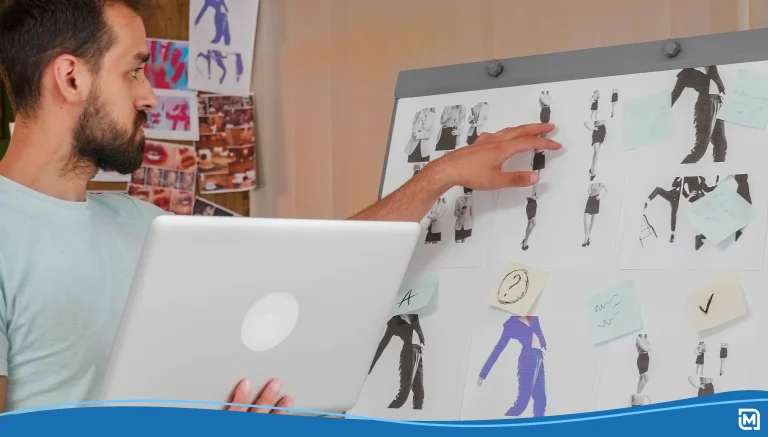 Young designer working on whiteboard and holding a laptop Stock Photo, ft. generative ai & ai images - Envato