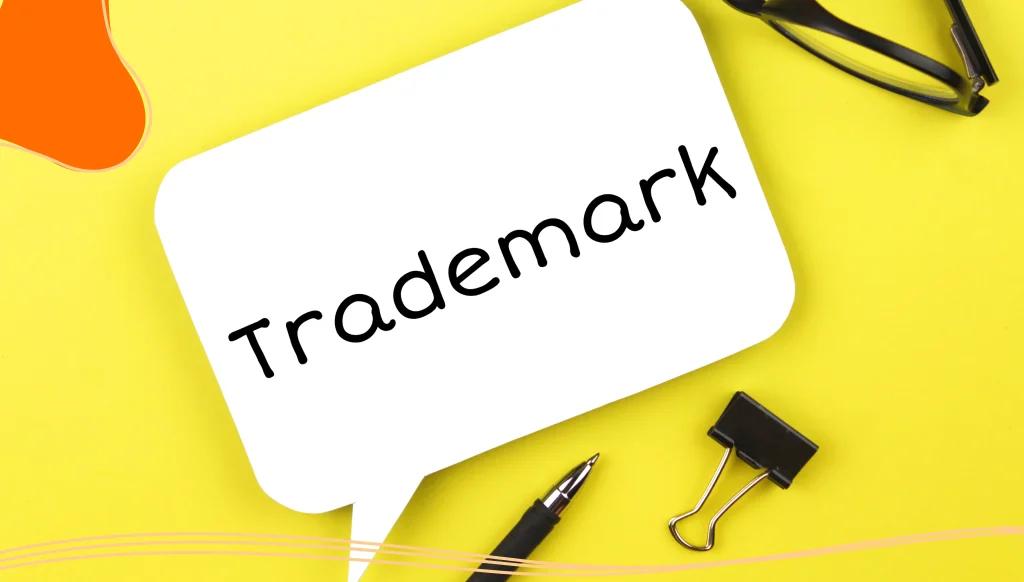 White paper speech bubble with inscription trademark