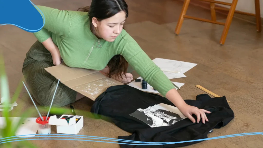 Woman carefully examining a t-shirt