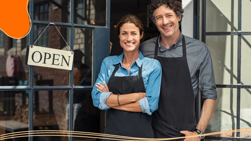 Small Business owners smiling