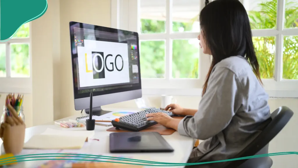 Person working on a logo template on the computer