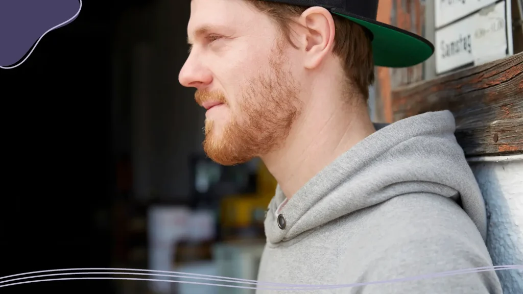 Man wearing a backwards cap