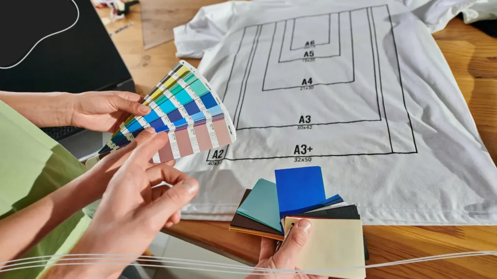 People looking at color palettes for T-shirts