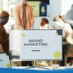 A busy office team collaborates to build your brand online and strengthen their online brand identity.