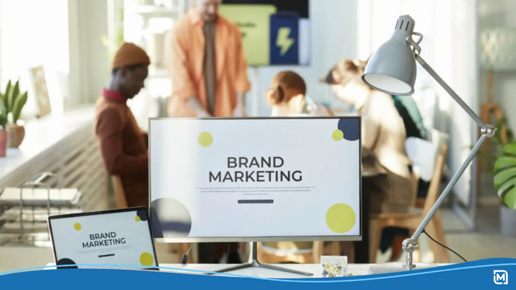 A busy office team collaborates to build your brand online and strengthen their online brand identity.