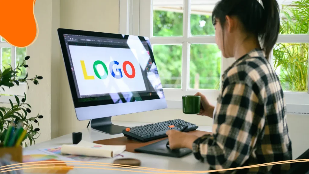 Person designing a logo at a computer
