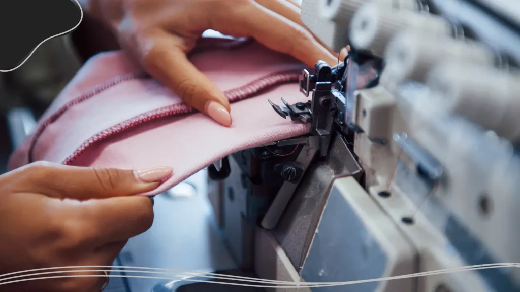 Person using an embroidery machine